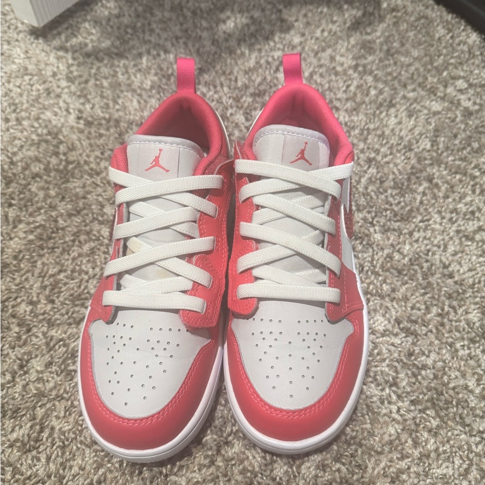 Pink and white Jordan’s with swarovski diamond check marks